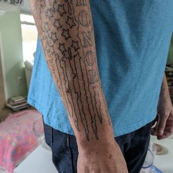 Big Top Tattoo - Unfinished distressed American flag after second sitting