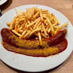 Schwarzer Adler - Currywurst mit Pommes