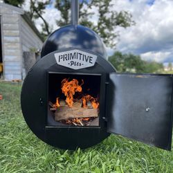 Our 500 Gallon offset smoker manufactured by Primitive Pits.