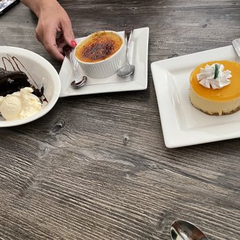Ceviche Arigato - Chocolate Tart with Vanilla Ice Cream Creme Bulee De Quinoa and Cheesecake De Maracuya - Peruvian Near Me - Weston, Florida Ceviche Arigato - Chocolate Tart with Vanilla Ice Cream Creme Bulee De Quinoa and Cheesecake De Maracuya - Peruvian Near Me - Weston, Florida