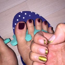 The Nails Of Utopia - OPI gel glitter french done by Jennifer. Essie polish pedicure done by Patricia.