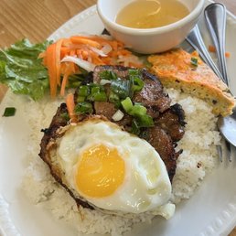 number 52 Pork chop and broken rice with fried egg number 52 Pork chop and broken rice with fried egg