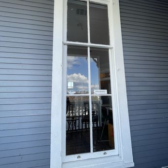 Two Tides Brewing Company - The unique sliding window accessing the rear deck. - Breweries Near Me - Savannah, Georgia Two Tides Brewing Company - The unique sliding window accessing the rear deck. - Breweries Near Me - Savannah, Georgia