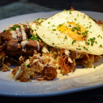 Au Cheval - Hash with duck heart gravy and egg - Bars Near Me - Chicago, Illinois Au Cheval - Hash with duck heart gravy and egg - Bars Near Me - Chicago, Illinois