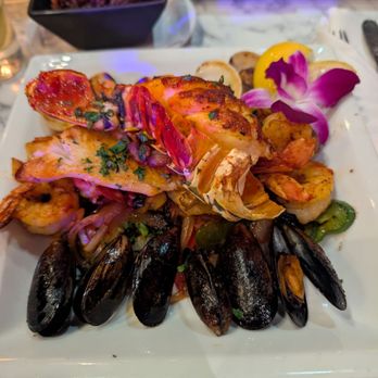Estefan Kitchen Orlando - Grilled Seafood Platter - Cuban Near Me - Kissimmee, Florida Estefan Kitchen Orlando - Grilled Seafood Platter - Cuban Near Me - Kissimmee, Florida