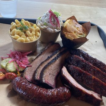 Heritage Barbecue - 1/2 lb brisket, about 1/2 lb baby back ribs, 1 sausage, 8 oz potato salad, 8 oz mac & cheese, 1 piece of cornbread - Barbeque Near Me - San Juan Capistrano, California Heritage Barbecue - 1/2 lb brisket, about 1/2 lb baby back ribs, 1 sausage, 8 oz potato salad, 8 oz mac & cheese, 1 piece of cornbread - Barbeque Near Me - San Juan Capistrano, California