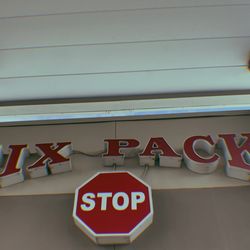 Six Pack Stop - Business Name