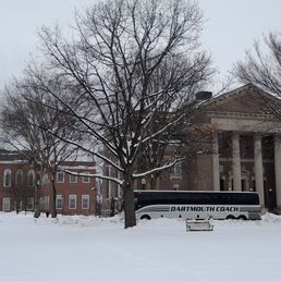 My coach standing in front of Rauner Library and Baker Hall at Dartmouth College in Hanover, NH.
