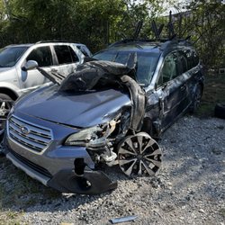 Butler's Wrecker Service & Auto - My totaled Subaru Outback parked at Butler's Tow Lot