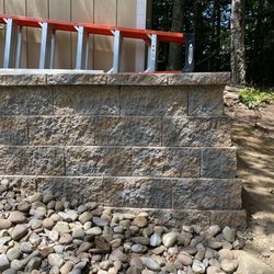 Uncle Bob's Florist & Garden Center - Job 1:  New concrete wall to support the shed. All hand laid and hand cut to perfection.
