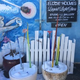 Entrance with a few glass pieces displayed.