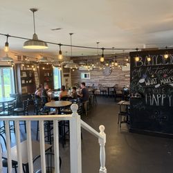 Bailey's Ice Cream and Smokehouse - View from the top of the stairs, overlooking the game area and seating area
