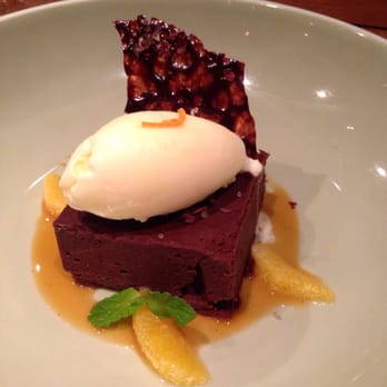 Ka'ana Kitchen - Flourless chocolate cake with maui orange sorbet - excellent contrasts, refreshing orange balances the chocolate decadence. - Asian Fusion Near Me - Wailea, Hawaii