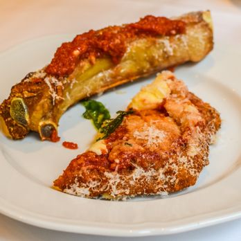 Carbone - The juicy bone meat is arguably the silver lining of the dish - Italian Near Me - New York, New York Carbone - The juicy bone meat is arguably the silver lining of the dish - Italian Near Me - New York, New York