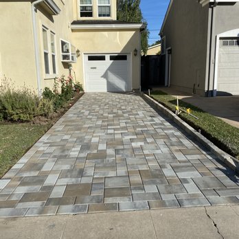 Modern Paving - The driveway, just before completion. (The crew cleaned up all of the debris in the grass.) - Masonry/Concrete Near Me - San Mateo, California