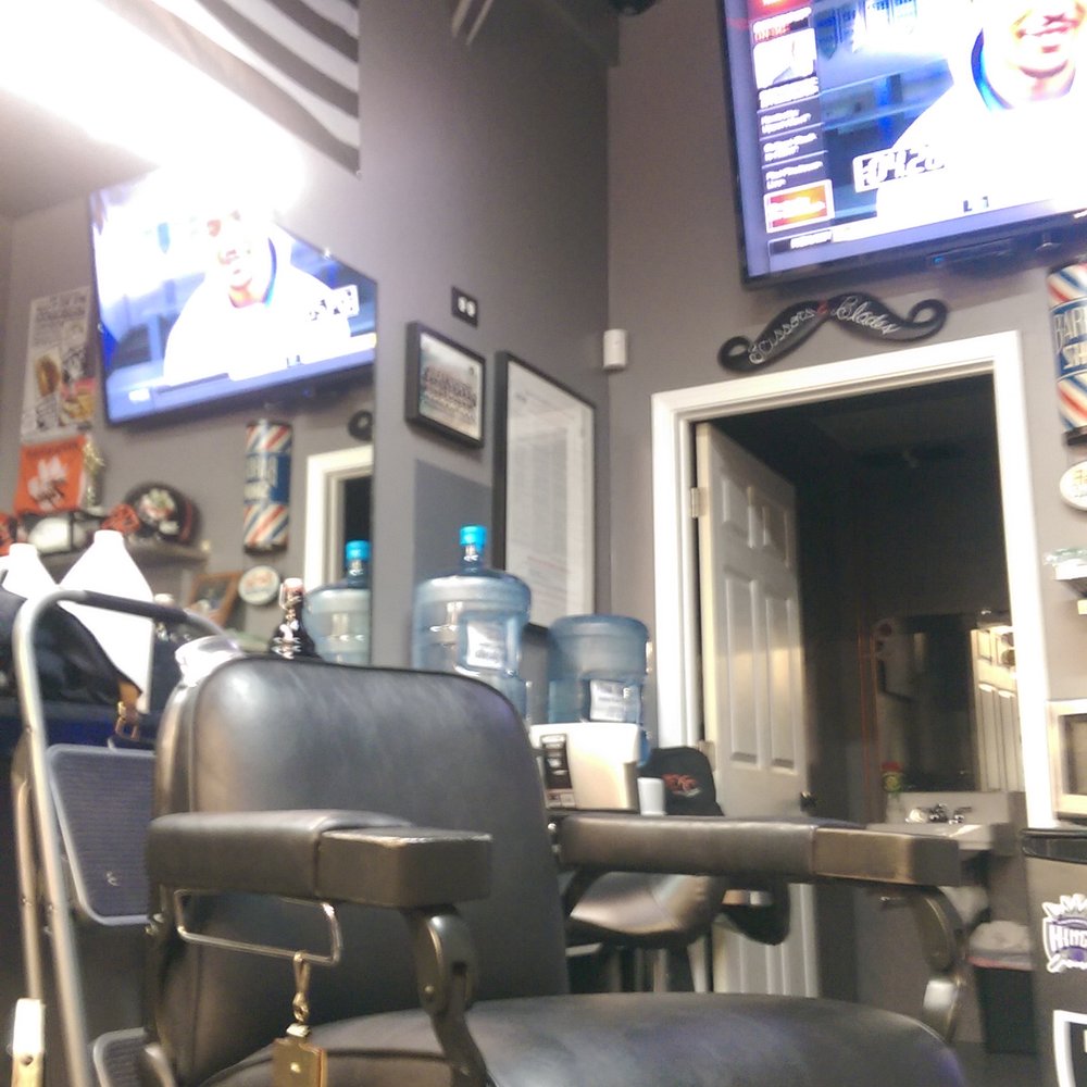 Scissors & Blades - This is where it all happens, but his chair is white. Look for the white chair, you found Rogans station. - Barbers Near Me - Roseville, California Scissors & Blades - This is where it all happens, but his chair is white. Look for the white chair, you found Rogans station. - Barbers Near Me - Roseville, California