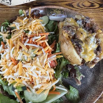 Buffalo Grill - Hochatown - Stuffed baked potato and side salad - American Near Me - Broken Bow, Oklahoma Buffalo Grill - Hochatown - Stuffed baked potato and side salad - American Near Me - Broken Bow, Oklahoma