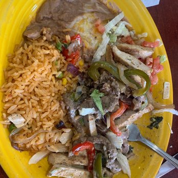 La Carreta - a yellow plate of mexican food - Mexican Near Me - Lansing, Kansas La Carreta - a yellow plate of mexican food - Mexican Near Me - Lansing, Kansas