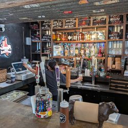 Lockhart Smokehouse - Full bar with friendly lady tending