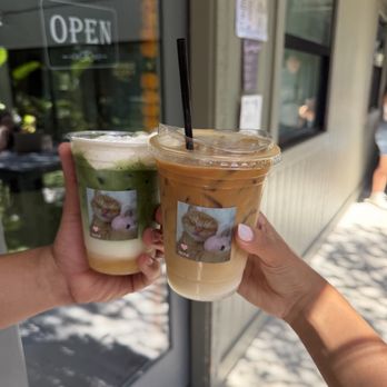 Leche Coffee - In the photo we have an iced vanilla latte and a brown syrup pear matcha? Something like that, I could be wrong lol. - Coffee & Tea Near Me - Austin, Texas Leche Coffee - In the photo we have an iced vanilla latte and a brown syrup pear matcha? Something like that, I could be wrong lol. - Coffee & Tea Near Me - Austin, Texas
