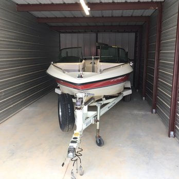 Jimani Self Storage - A lighted unit makes it much easier to prepare your boat. - Self Storage Near Me - Rogers, Arkansas Jimani Self Storage - A lighted unit makes it much easier to prepare your boat. - Self Storage Near Me - Rogers, Arkansas