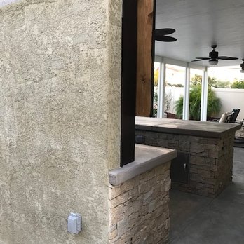 McCabe's Landscape Construction - The wooden cabinet looks nice from afar but stand close and o'boy... Paint missing on the back of this door. - Landscaping Near Me - Murrieta, California