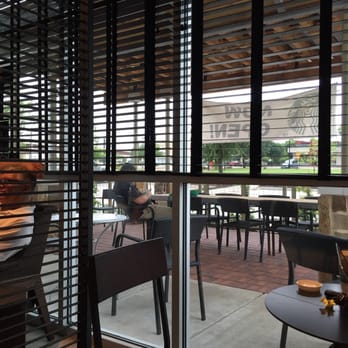 Starbucks - Nice seating but it's wet outside today - Coffee & Tea Near Me - Grapevine, Texas