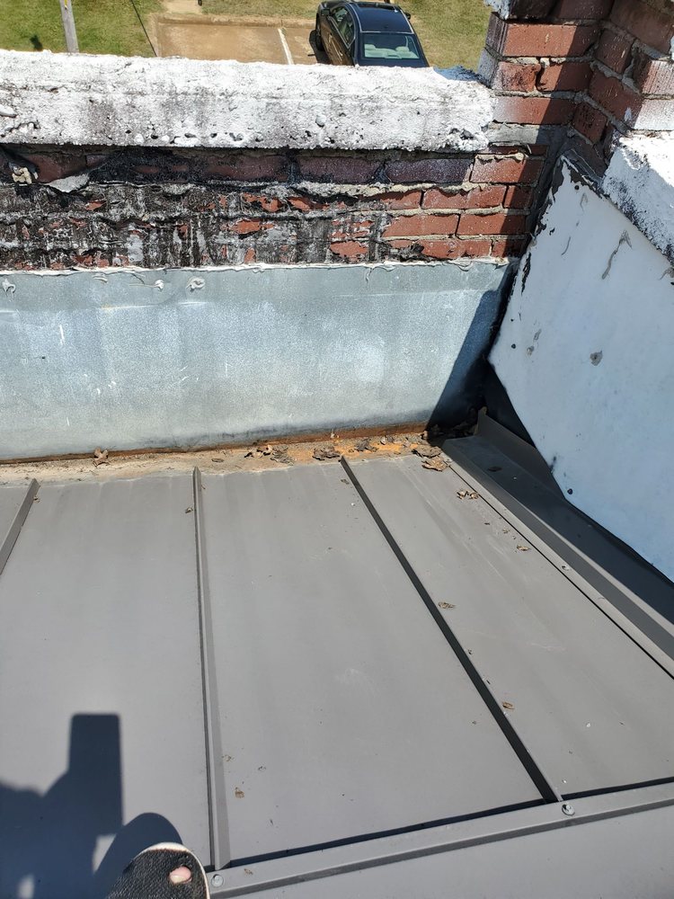 Slide of Powell's Roofing & Remodeling