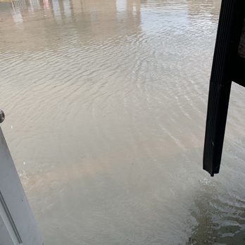 Devonshire Apartments - Flooded parking lot on July 8, 2026. - Apartments Near Me - Baton Rouge, Louisiana Devonshire Apartments - Flooded parking lot on July 8, 2026. - Apartments Near Me - Baton Rouge, Louisiana