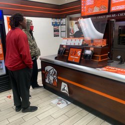 Little Caesars Pizza - Waiting hordes.  Pizzas 20-30 minutes late