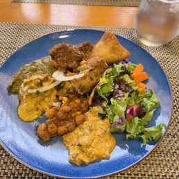 Here is my plate of samosas, various curry dishes, salad and lamb curry. Here is my plate of samosas, various curry dishes, salad and lamb curry.