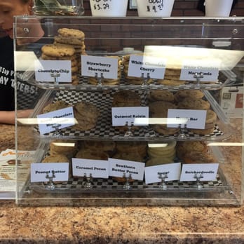 Prater's Taters - a woman looking at a display of pastries - Sandwiches Near Me - Parsons, Tennessee Prater's Taters - a woman looking at a display of pastries - Sandwiches Near Me - Parsons, Tennessee