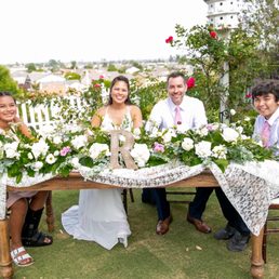 My husband, our kids, and me at our head table. Beautiful photo captured by Jazley My husband, our kids, and me at our head table. Beautiful photo captured by Jazley