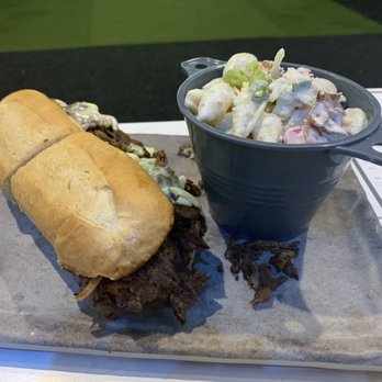 Crush It! Sports Lounge - Philly cheesesteak and pasta salad. - Sports Bars Near Me - Grapevine, Texas