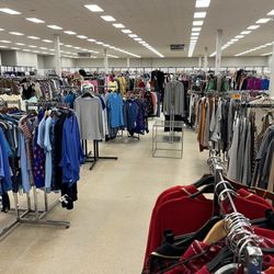 Designer Row - Clothing racks. It's a large store!