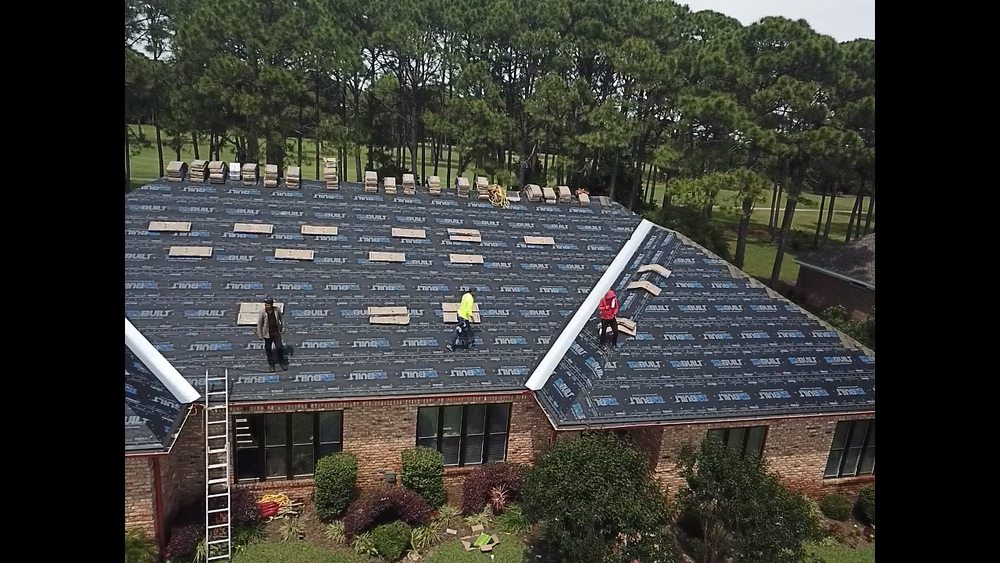 Slide of OIL PATCH ROOFING