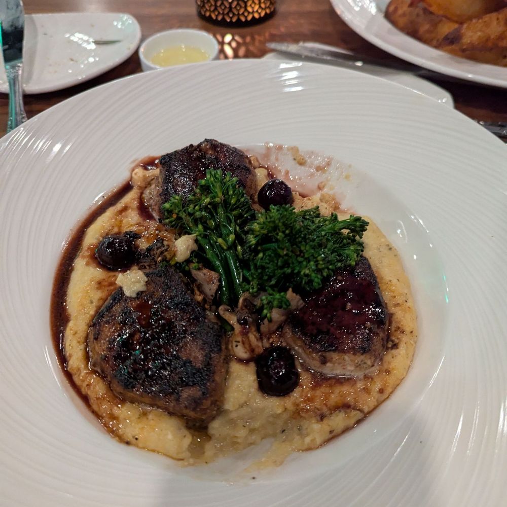 The Chapman - Pork loin with polenta - Lounges Near Me - Winter Park, Florida The Chapman - Pork loin with polenta - Lounges Near Me - Winter Park, Florida
