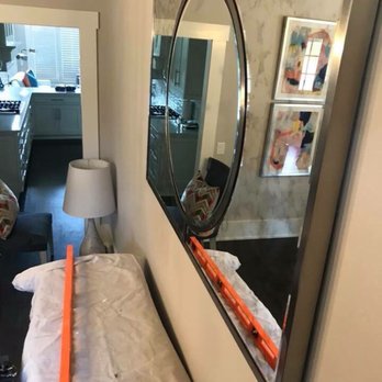 Hangman Business Installation - a mirror and a bed - TV Mounting Near Me - Columbus, Georgia