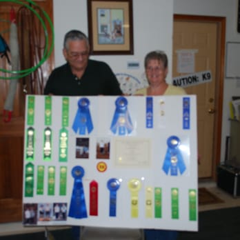 Southpaw Training - George and Shirley with Smokey's Rally awards - Pet Training Near Me - Alvin, Texas Southpaw Training - George and Shirley with Smokey's Rally awards - Pet Training Near Me - Alvin, Texas