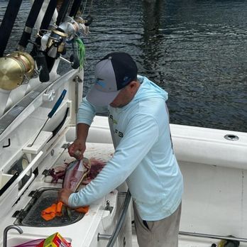 OAPB Fishing - Capt. Shaughn filleting customer fish - Fishing Near Me - Pompano Beach, Florida