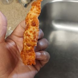 Layer of cheese & pepperoni from my last pizza.