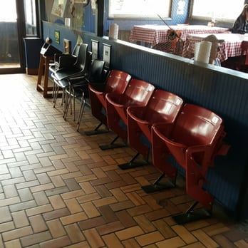 Yesterday's BBQ - a row of red chairs in a restaurant - Barbeque Near Me - Metropolis, Illinois Yesterday's BBQ - a row of red chairs in a restaurant - Barbeque Near Me - Metropolis, Illinois