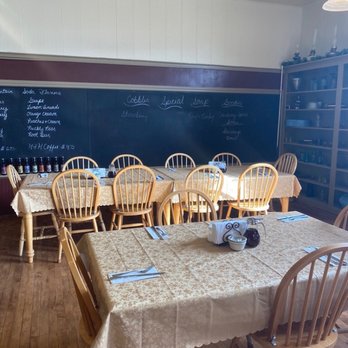 Old Schoolhouse Cafe - Blackboard behind big family table - Coffee & Tea Near Me - Dell, Montana Old Schoolhouse Cafe - Blackboard behind big family table - Coffee & Tea Near Me - Dell, Montana