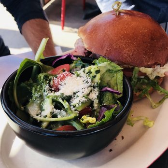 The Arrogant Butcher - Turkey pastrami sandwich with side salad. - American Near Me - Phoenix, Arizona