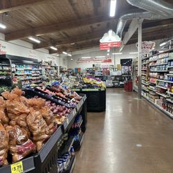 Grocery Outlet - Entrance of the store to vegetable area. And coffee,and Condiments.