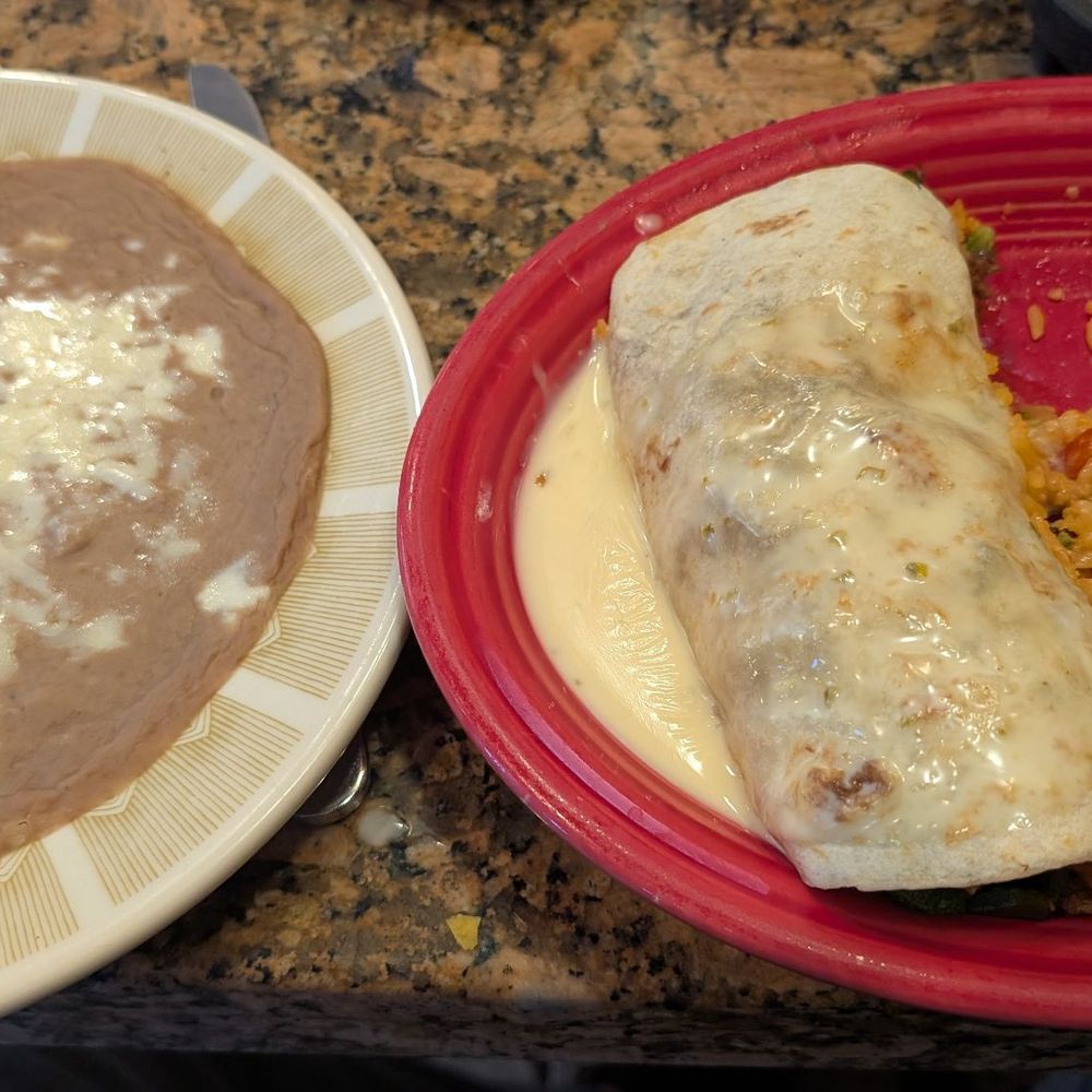 Casa Tlaquepaque - This is their lunch special. It's called a fajita burrito. It's full of vegetables I got the steak ... it also came with Mexican rice - Mexican Near Me - North Canton, Ohio Casa Tlaquepaque - This is their lunch special. It's called a fajita burrito. It's full of vegetables I got the steak ... it also came with Mexican rice - Mexican Near Me - North Canton, Ohio