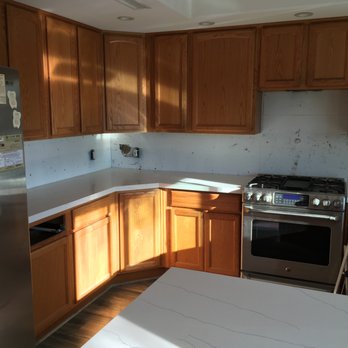 Pesach Painting - Before picture of cabinets - Painters Near Me