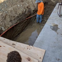 A.M. Plumbing and Rooter in 6.5 foot trench for grease trap install. A.M. Plumbing and Rooter in 6.5 foot trench for grease trap install.