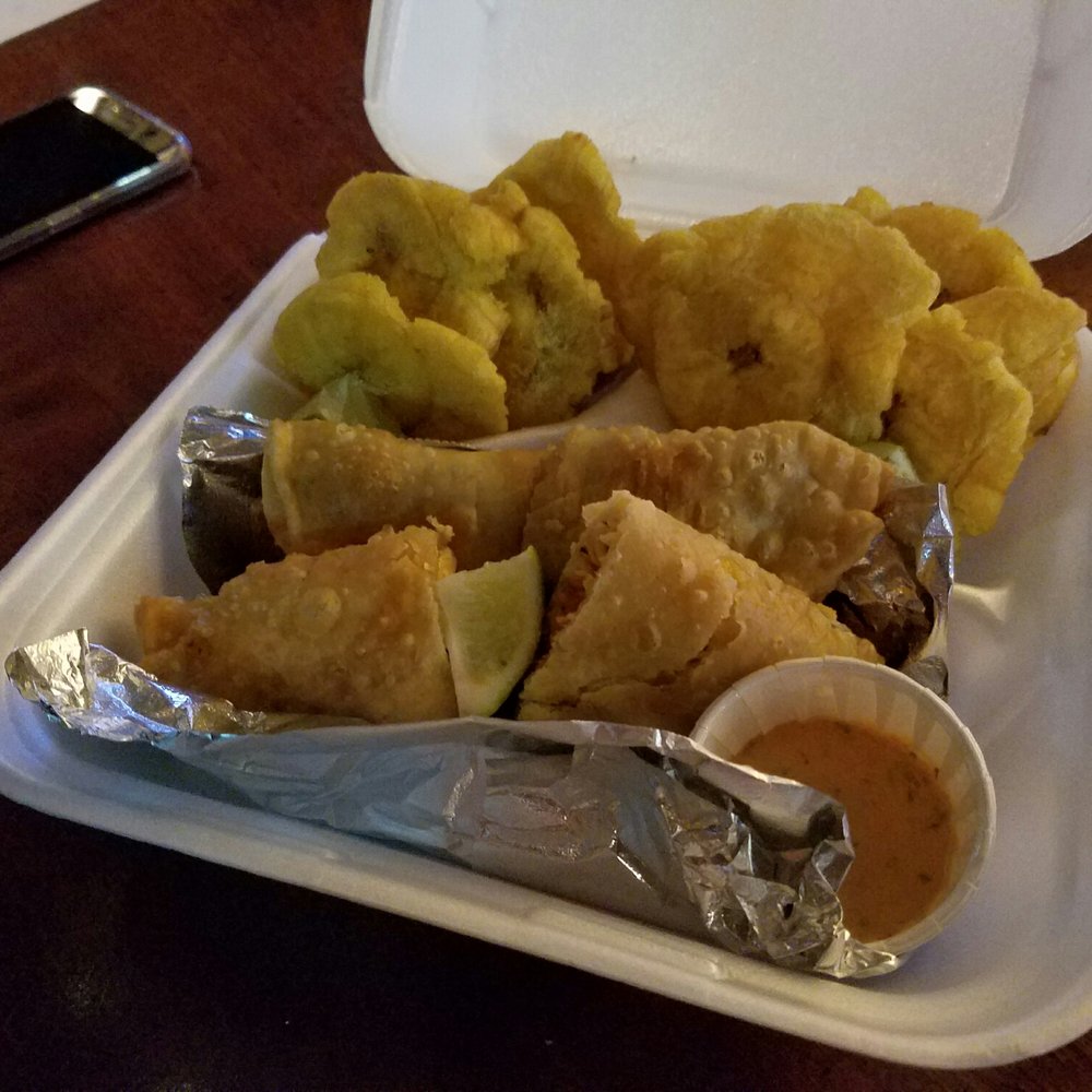 Authentic Empanadas - a tray of fried food - Street Vendors Near Me Authentic Empanadas - a tray of fried food - Street Vendors Near Me