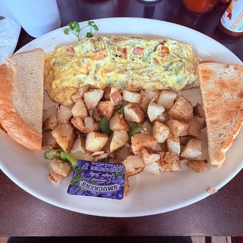 Omelette House - This is a Denver Omelet with home fries and sourdough bread. - Breakfast & Brunch Near Me - Garden Grove, California Omelette House - This is a Denver Omelet with home fries and sourdough bread. - Breakfast & Brunch Near Me - Garden Grove, California